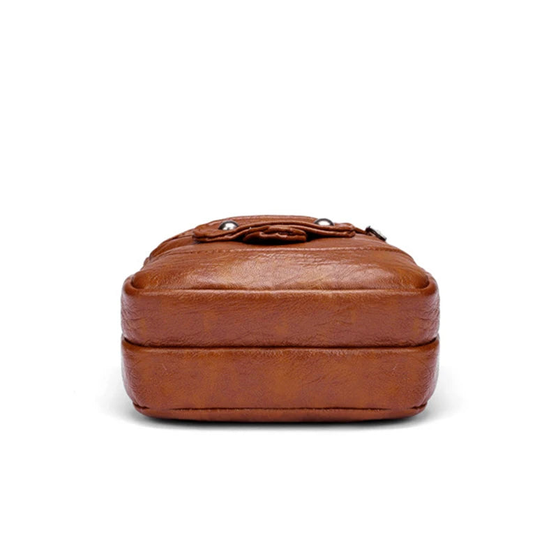 BOLSA TRANSVERSAL FEMININA EM COURO PU PREMIUM